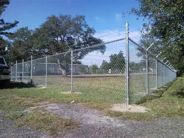 Commercial chain link fence with privacy slats Fort Worth TX