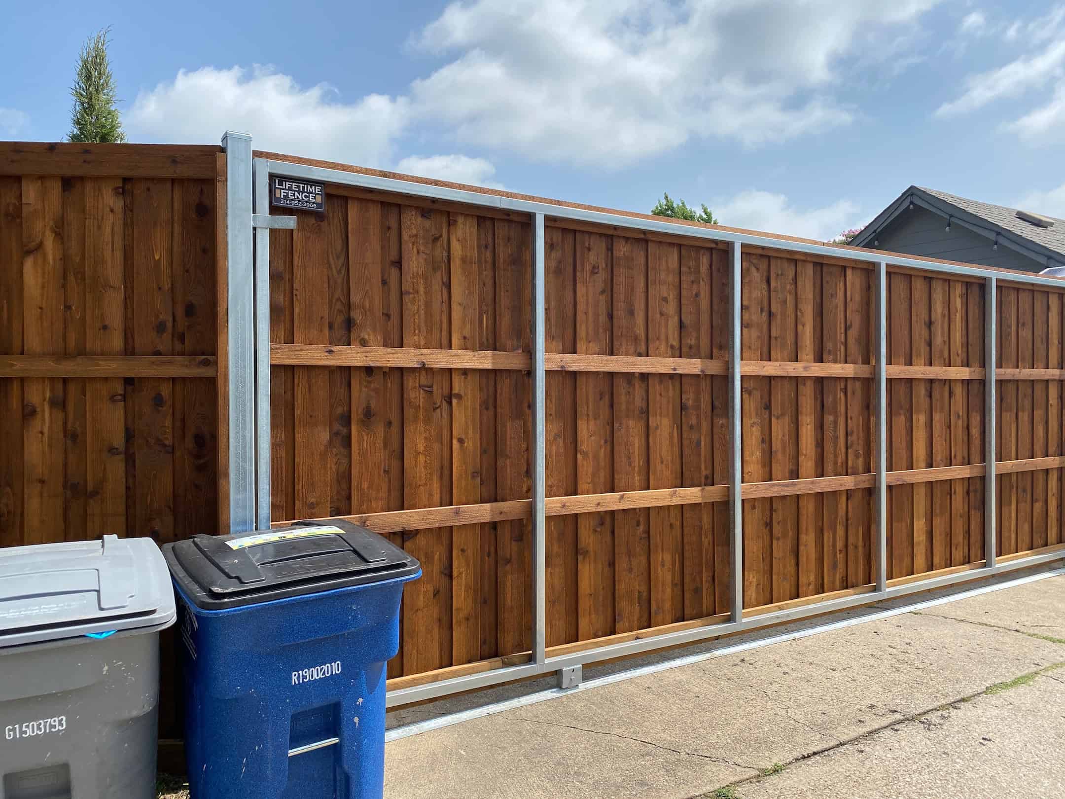 Dual swing driveway gate with ball bearing hinges Lewisville TX