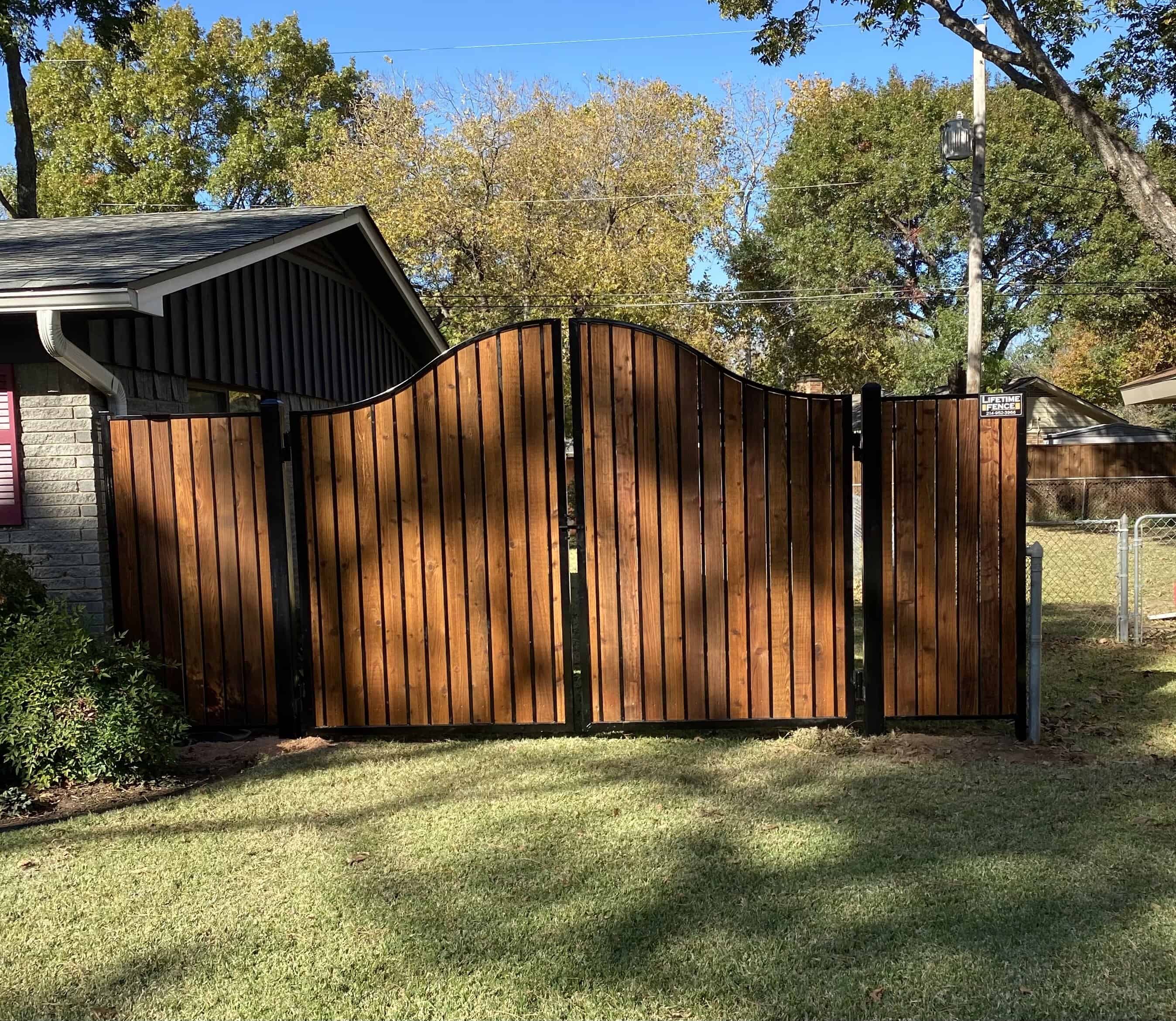 Ornamental iron gate with cedar pickets Frisco TX