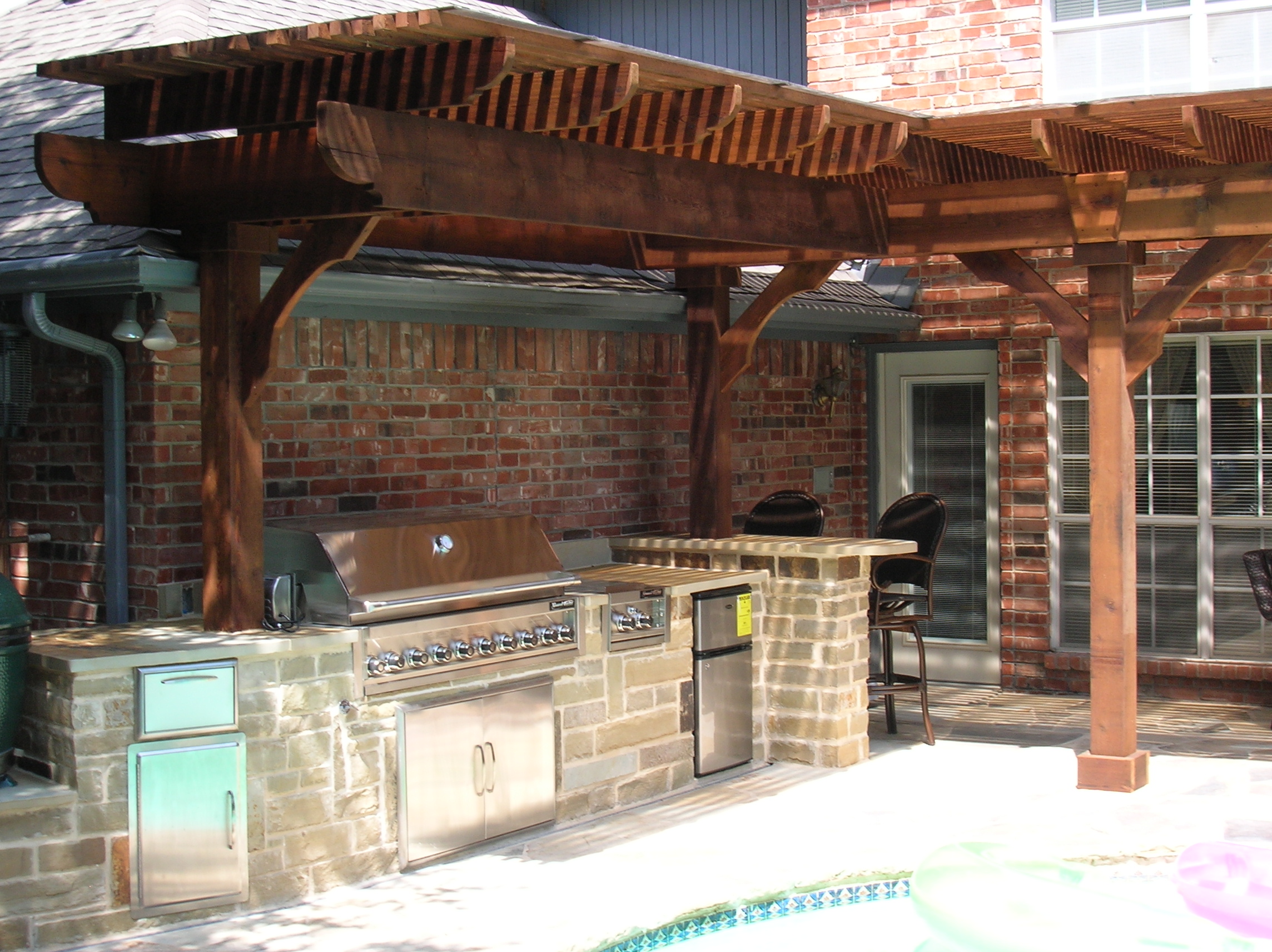 Outdoor kitchen island and cedar pavilion Southlake TX