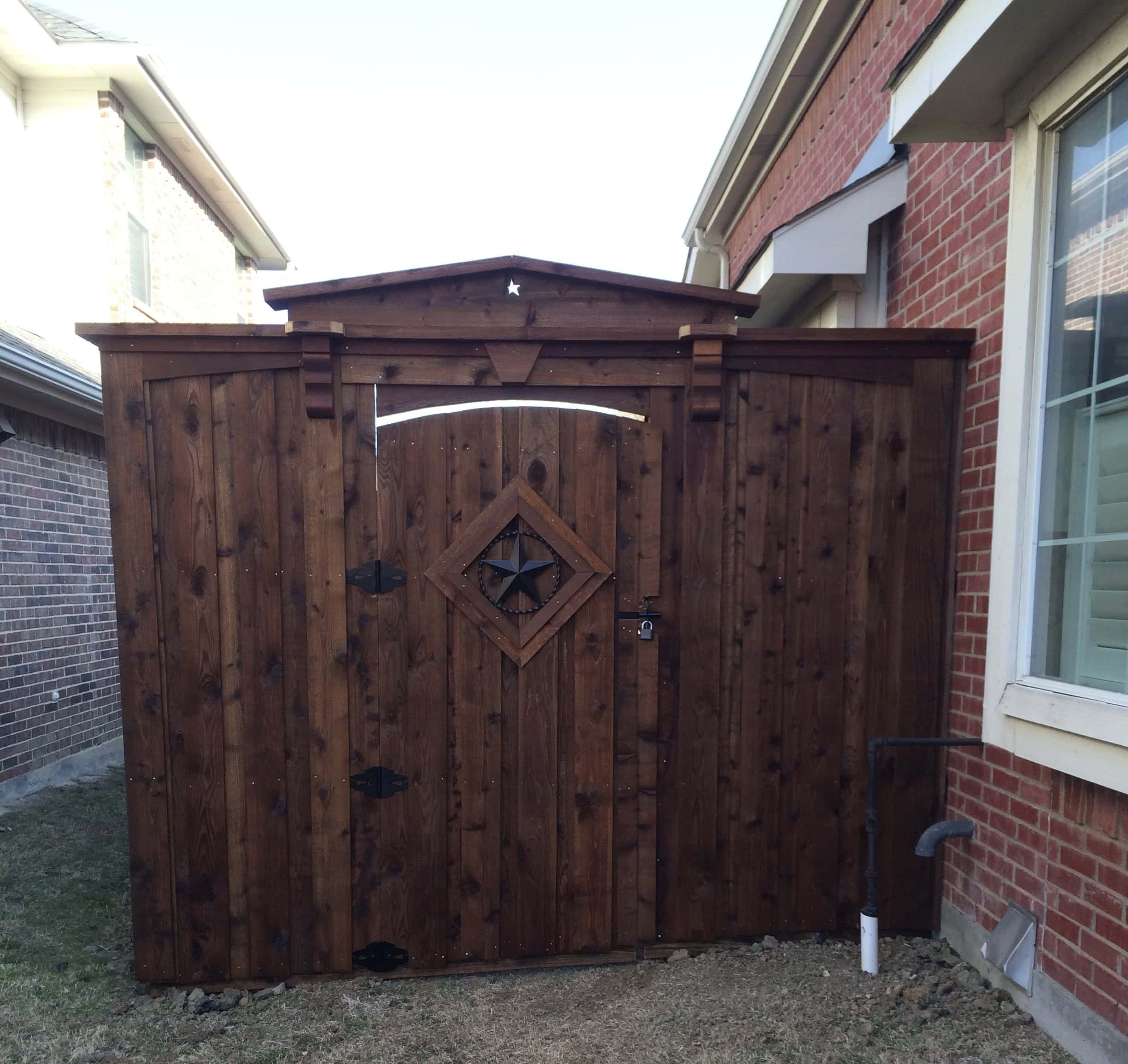 Custom cedar fence contoured to terrain Flower Mound TX