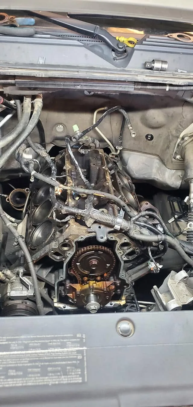 Engine teardown in progress inside a vehicle