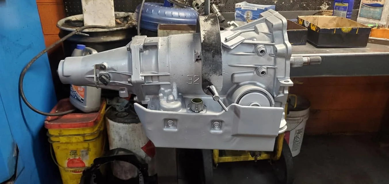 Rebuilt transmission assembly on a workbench